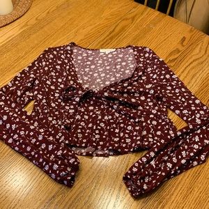 Cropped babydoll top with flower pattern